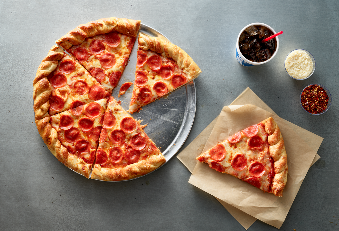 Large pepperoni and cheese pizza with a Pilot fountain drink 