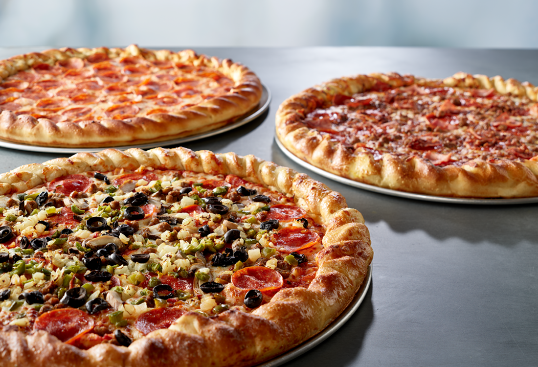 Three large pizzas with hand-roped crust