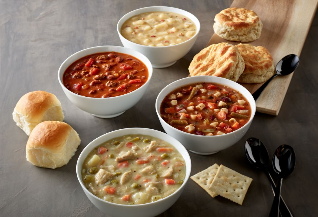 Four fresh soups with crackers, rolls and biscuits